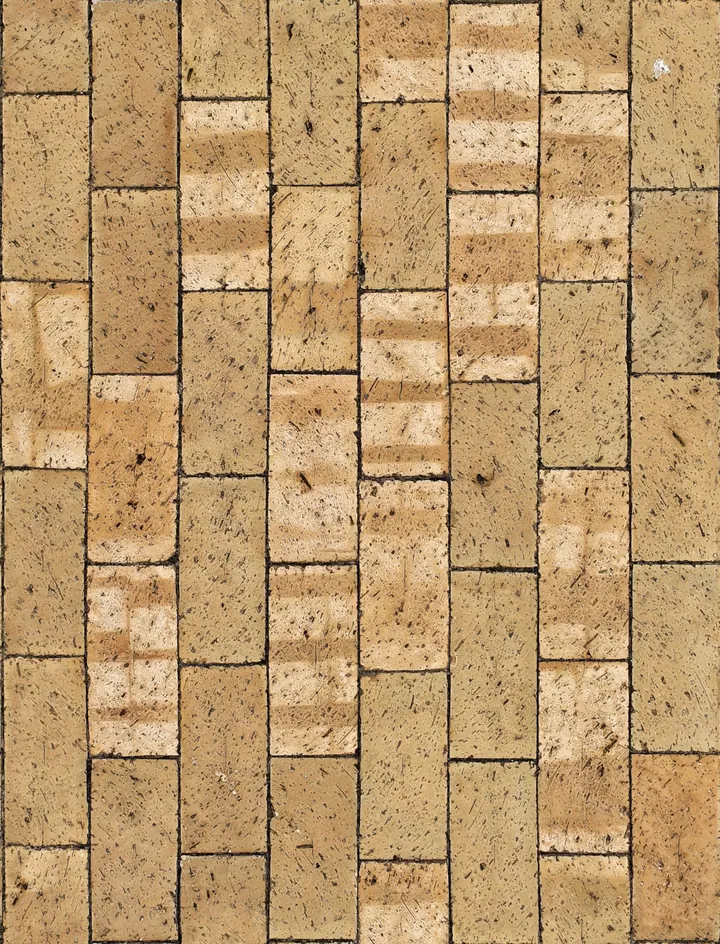 A close view of light-coloured paving units